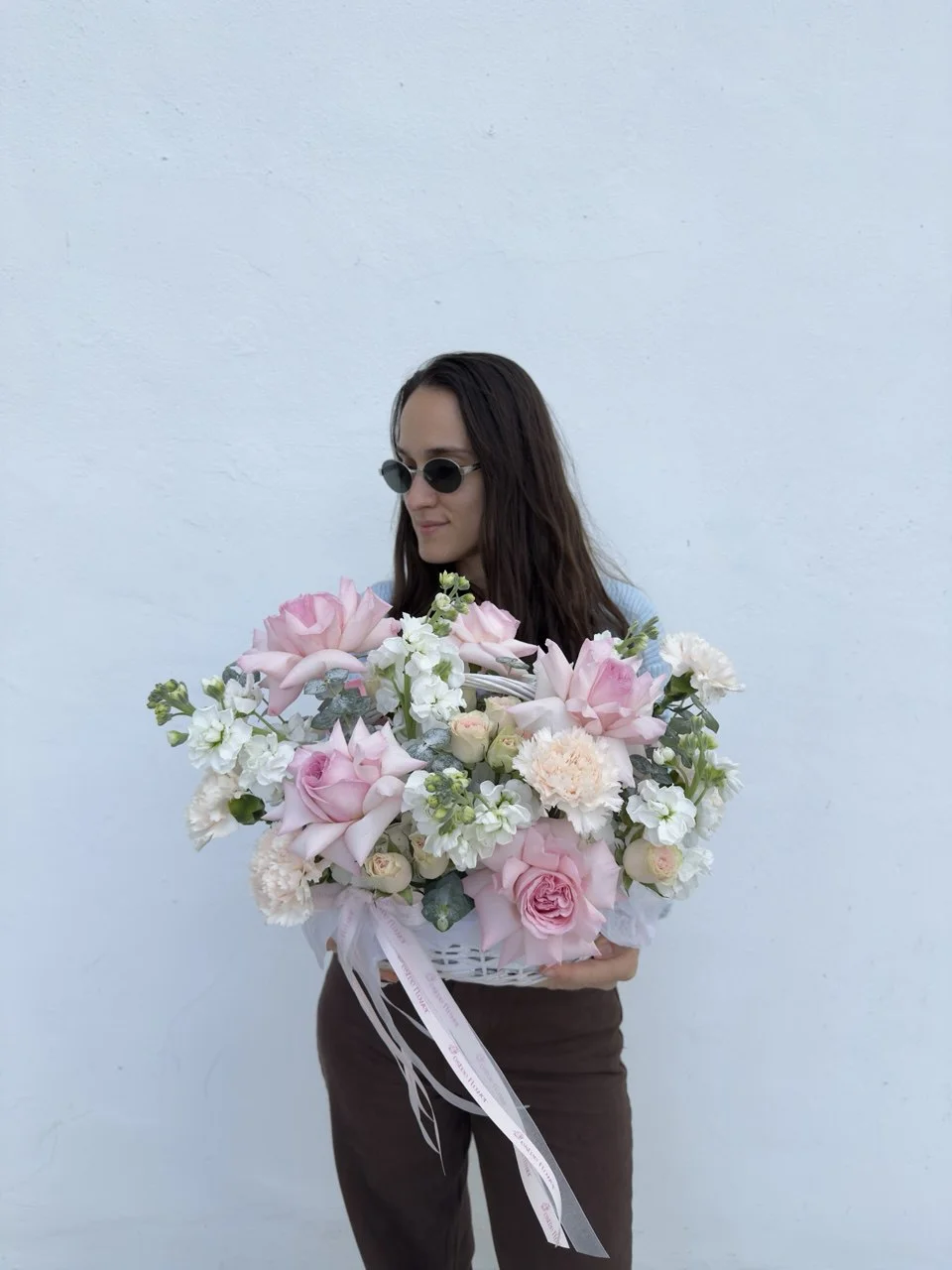 The thinking of you arrangement flower basket with garden roses and soft pastel blooms