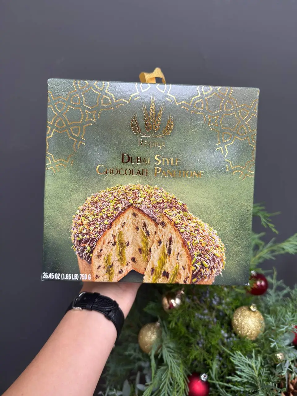 Dubai style panettone Christmas cake with pistachio cream and chocolate glaze